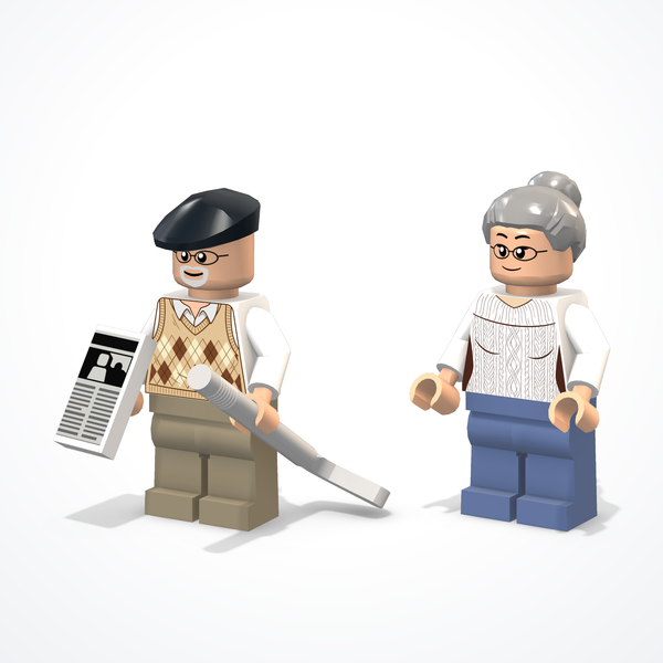 Figurki babci i dziadka: dziadek w kaszkiecie z gazetą i laską, babcia z siwym kokiem